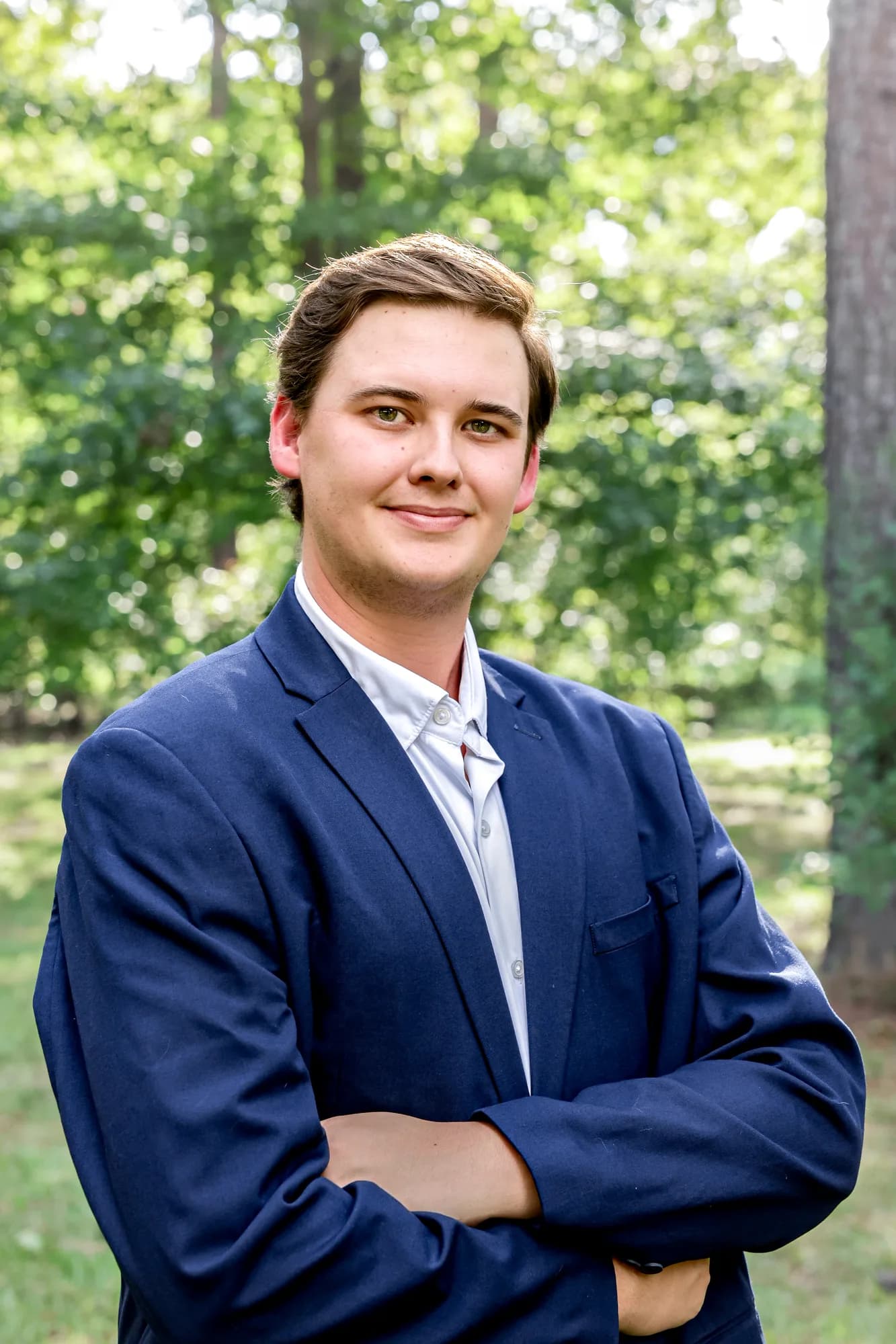 Portrait of Quade Wells, COO of FLUENT AI Solutions